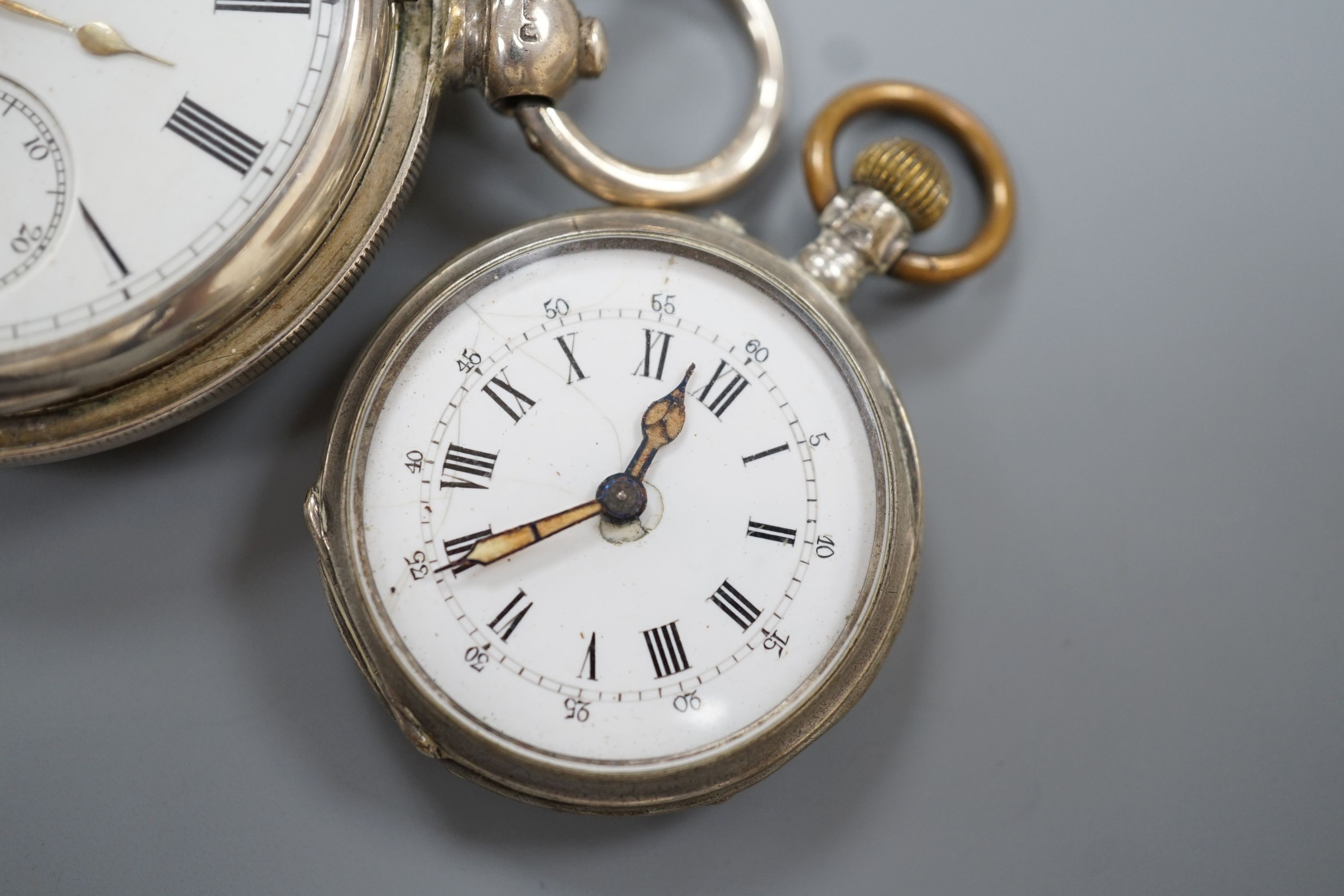 A Victorian silver keywind hunter pocket watch, case diameter 48mm and a white metal open face fob watch.